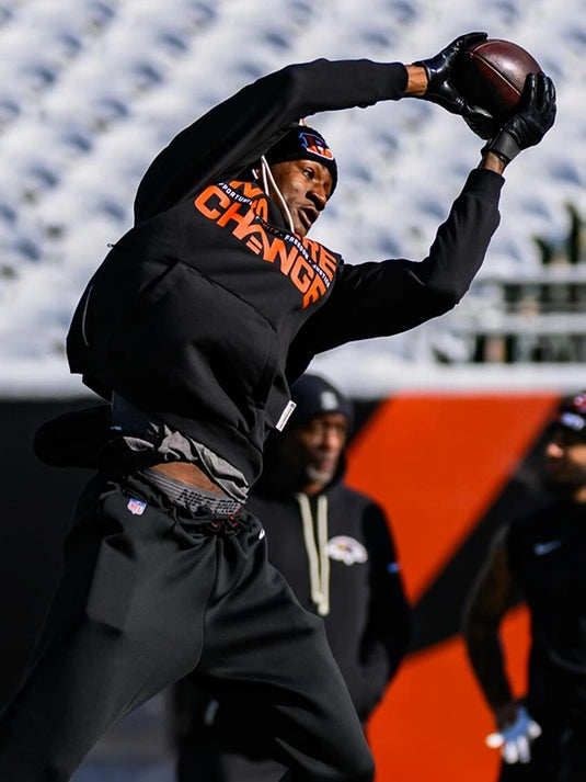 Black Nike Cincinnati Bengals sideline pullover hoodie from the 2025 Inspire Change lineup with bold typography