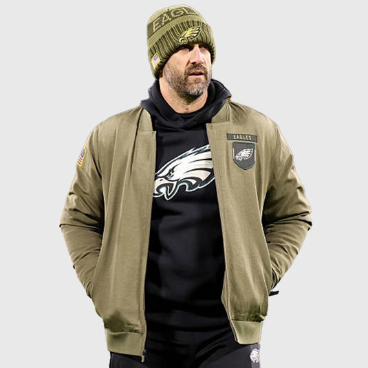 2025 Salute to Service Philadelphia Eagles olive green bomber jacket featuring durable cotton construction and relaxed fit.