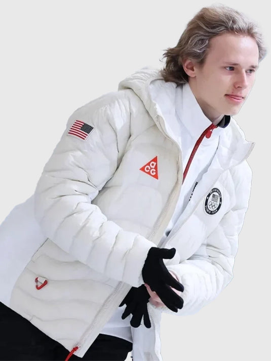 Winter Olympic 2026 Team USA white puffer jacket with Nike ACG branding and Therma-FIT ADV quilted design