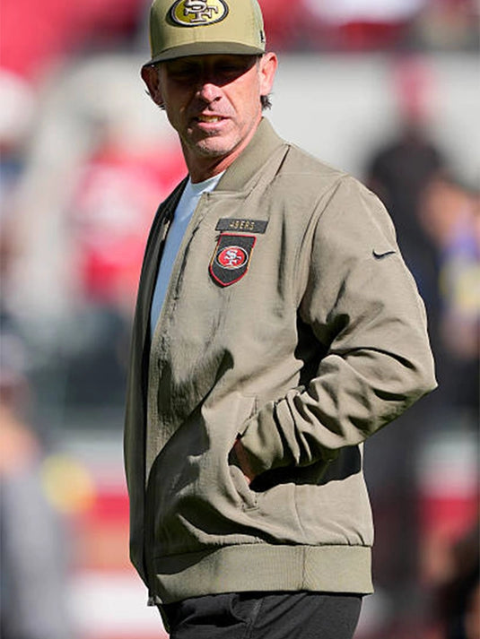 Kyle Shanahan San Francisco 49ers Salute to Service 2025 olive green cotton bomber jacket with sideline-inspired design.