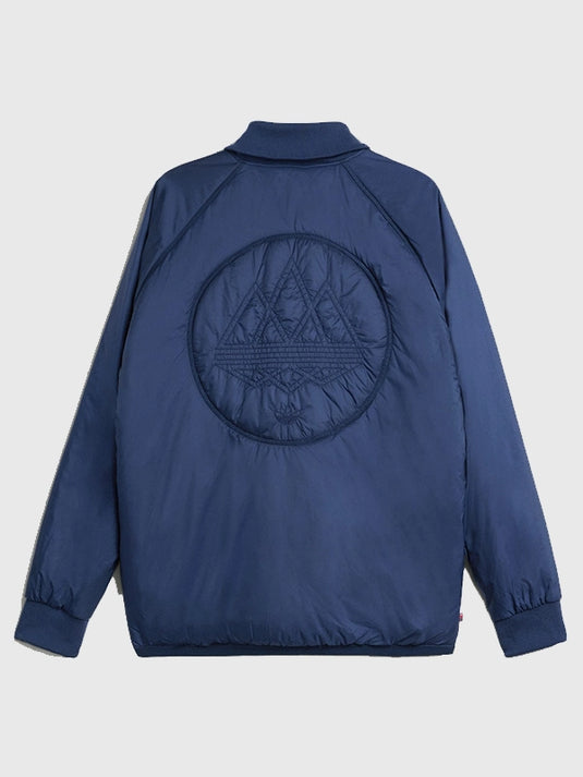 Adidas 2025 Bramhope Spzl Blue Bomber Jacket offering a fusion of vintage design and modern streetwear appeal.