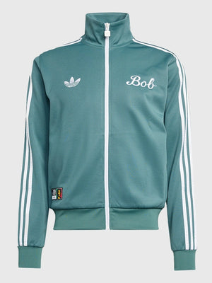 Adidas x Bob Marley 2026 green track jacket recreated with football-inspired graphics and relaxed, sporty fit designed for everyday wear.