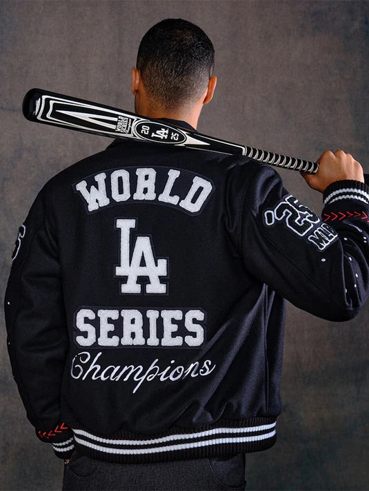 Joshua Vides x Fanatics Dodgers 2025 World Series Champions Varsity Jacket in black with embroidered detailing.