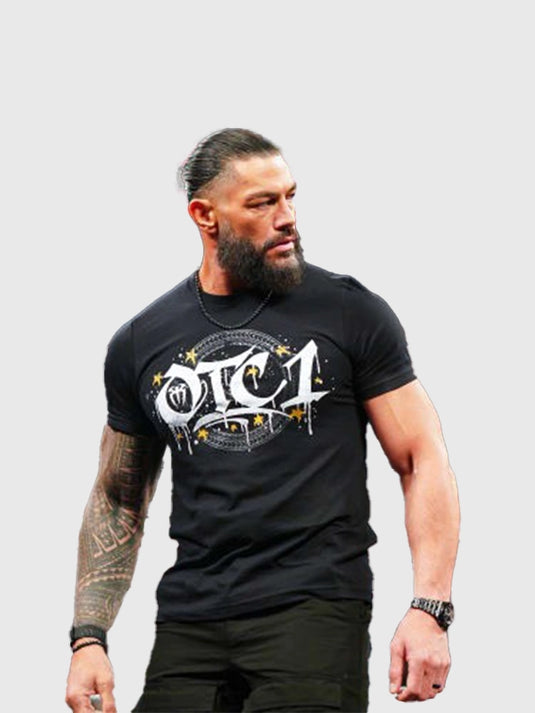 Recreated WWE RAW 2026 Roman Reigns crewneck t-shirt in black with a bold OTC-1 gold graphic and classic casual finish.