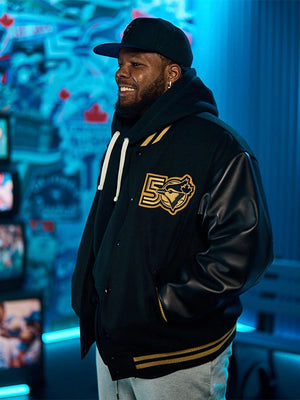 RECREATED Roots Toronto Blue Jays 50th Anniversary Merch Black Varsity Jacket featuring a classic varsity silhouette with premium outerwear construction