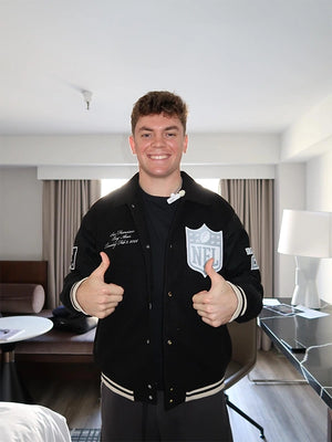 Black varsity jacket inspired by the 2026 Pro Bowl Games, recreated with a premium wool torso and genuine-style leather sleeves.
