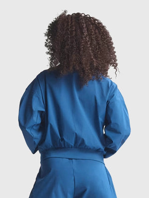RECREATED Adidas Z.N.E. 2026 Woven Blue Bomber Jacket showcasing a sleek bomber profile with minimal athletic design elements