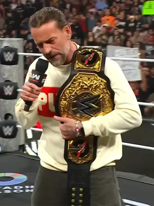 CM Punk beige Raw World Champion sweatshirt with premium print and ribbed edges.