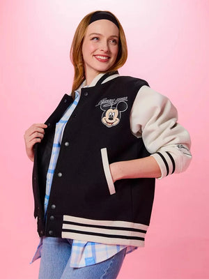RECREATED Mickey Mouse bomber varsity jacket for women by Cakeworthy in black with white sleeves and playful graphic energy