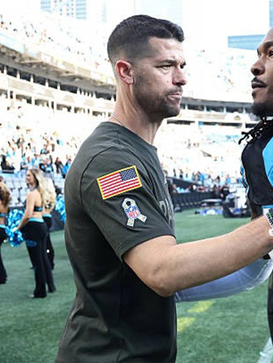 Carolina Panthers 2025 Nike forest green T-shirt offering comfort, team branding, and coach-inspired sideline design.
