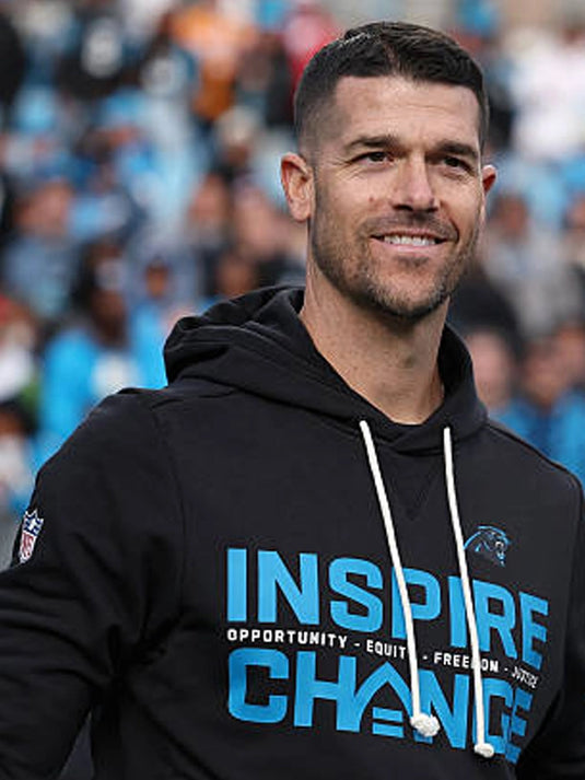 Black Nike sideline pullover hoodie from the Carolina Panthers 2025 Inspire Change collection with bold message typography