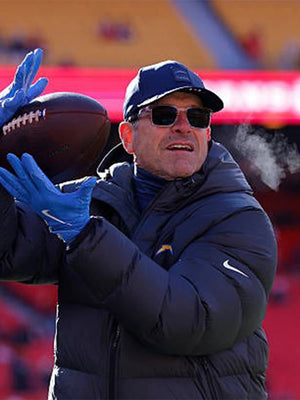 Black Nike Jim Harbaugh parachute puffer jacket for Chargers 2025 with modern athletic silhouette