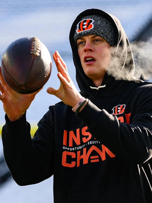 Cincinnati Bengals 2025 Inspire Change black Nike sideline pullover hoodie featuring Opportunity Equity Freedom Justice lettering