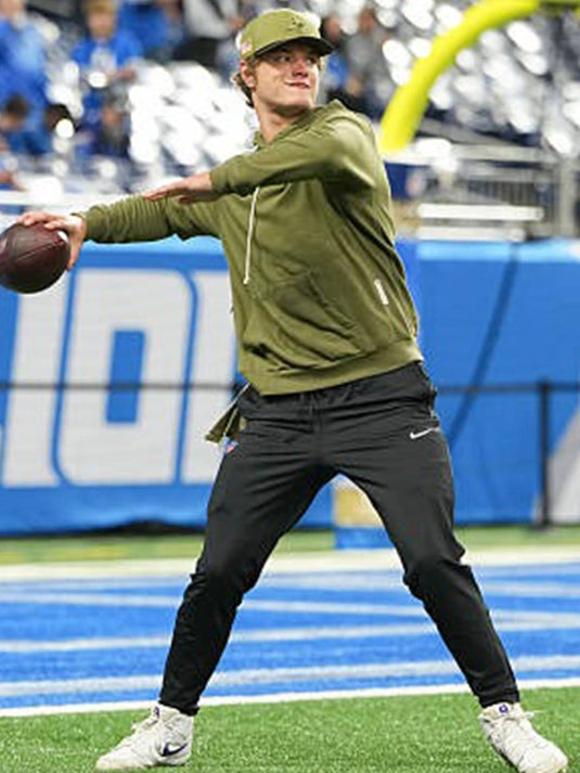 J.J. McCarthy Vikings 2025 Olive Green Hoodie designed with rib-knit cuffs and warm fleece texture.