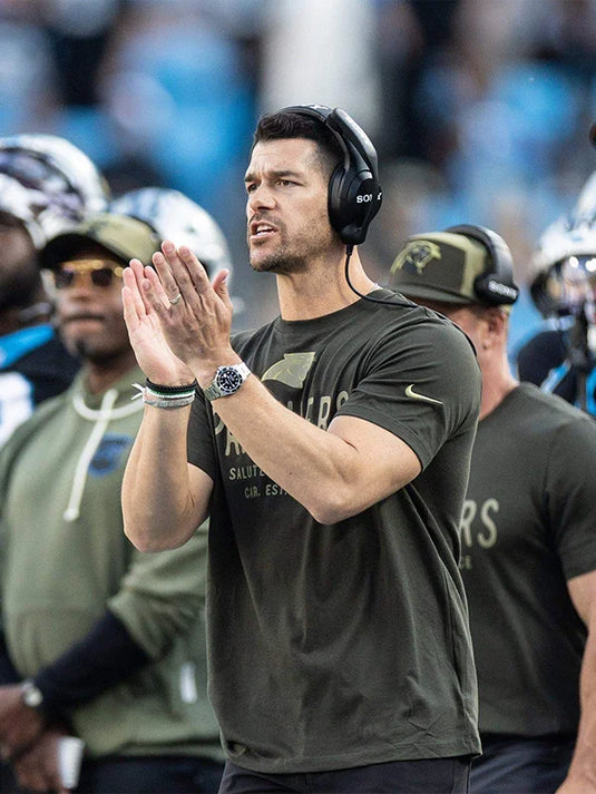 Nike 2025 Carolina Panthers forest green Salute to Service Sideline Primary Edge T-shirt for sideline athletic wear.