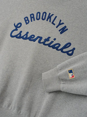 Jackie Robinson Day Essentials Fear of God Grey Oversized Pullover Hoodie with minimalist branding and premium cotton blend