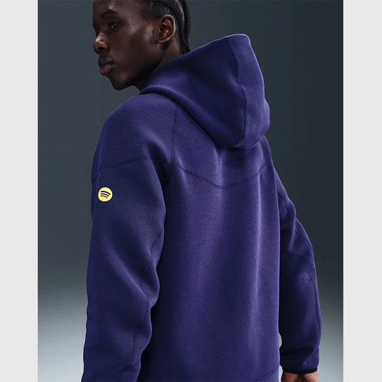 Soft fleece Nike Tech Windrunner hoodie for men showcasing FC Barcelona colors and detailing.