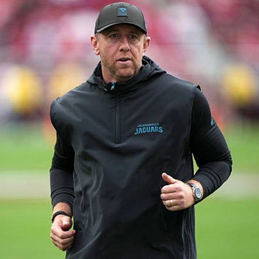 Coach Liam Coen Jacksonville Jaguars 2025 Black Sideline Half-Zip Vest with lightweight performance fabric and sleek detailing.
