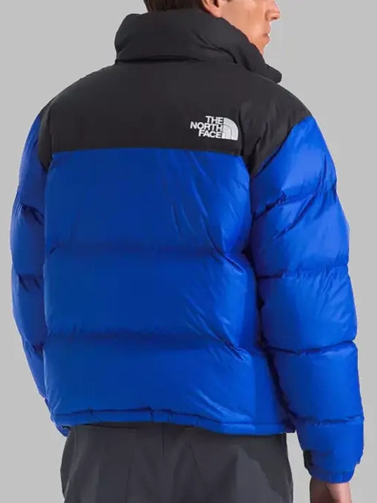 1996 Retro Nuptse recreation puffer jacket in blue with structured fit and outdoor-ready warmth