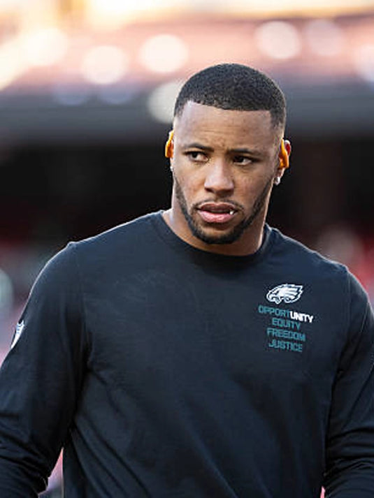 Philadelphia Eagles 2025 Inspire Change black Nike long sleeve t-shirt featuring Opportunity Equity Freedom Justice text