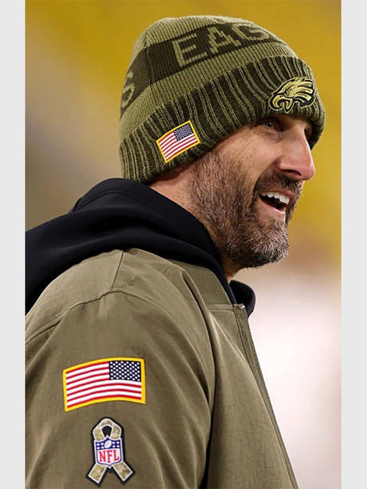 Philadelphia Eagles 2025 Salute to Service olive green bomber jacket inspired by Coach Nick Sirianni’s sideline style.