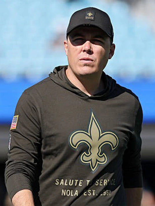 New Orleans Saints Salute to Service 2025 forest green pullover T-shirt inspired by Coach Kellen Moore’s sideline style.