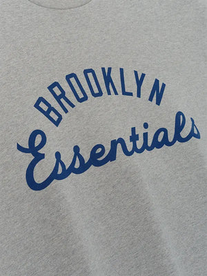 Jackie Robinson Day Essentials Fear of God Grey Oversized T-Shirt with minimalist branding and smooth jersey feel
