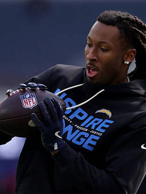Black Nike sideline pullover hoodie featuring Los Angeles Chargers Inspire Change Opportunity Equity Freedom Justice design Nike