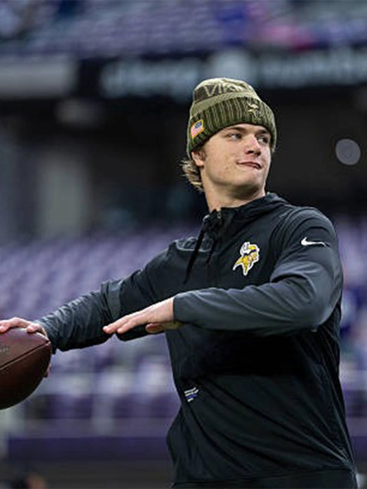 J.J. McCarthy-inspired Minnesota Vikings Nike Sideline Half-Zip Anorak Hoodie crafted in black for all-weather comfort.