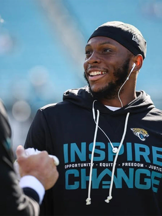 Jacksonville Jaguars Inspire Change 2025 black hoodie by Nike showcasing Opportunity Equity Freedom Justice design