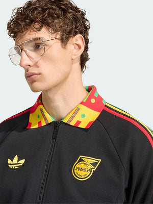 Recreated black Adidas Jamaica x Bob Marley Away Anthem jacket with lightweight zip closure and collaboration branding