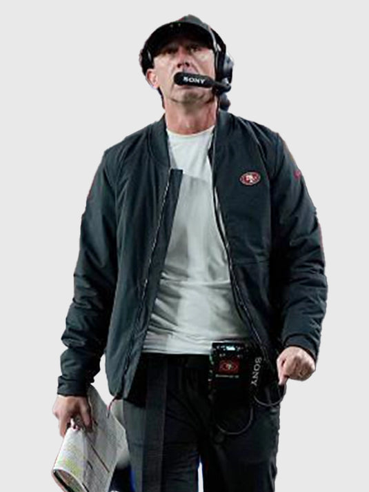 San Francisco 49ers black bomber jacket inspired by Kyle Shanahan recreated with modern sideline aesthetics
