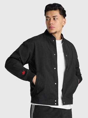 RECREATED Adidas Manchester United x Stone Roses 2026 black unisex jacket with collaborative streetwear styling