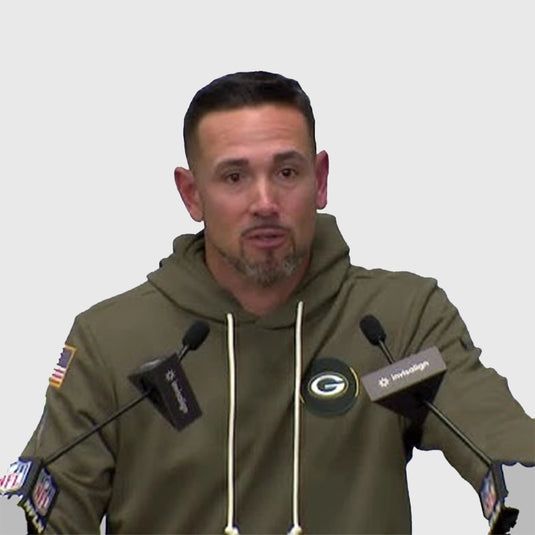 2025 Green Bay Packers Salute to Service sideline hoodie in olive green with soft fleece fabric and athletic fit.