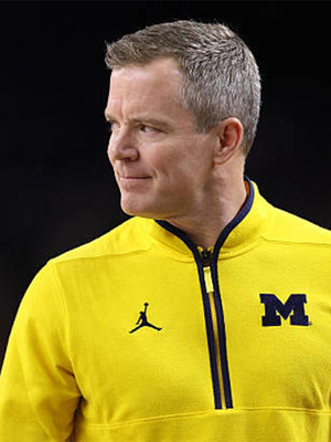 Recreated Michigan Wolverines Coach Dusty May yellow quarter-zip jacket with lightweight feel and streamlined silhouette