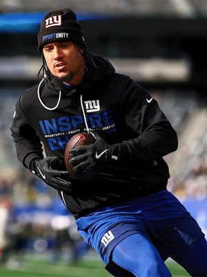 New York Giants black Nike sideline pullover hoodie from the 2025 Inspire Change collection with bold message text