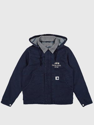 Recreated Carhartt WIP x New Balance Arcan hooded jacket in navy with a modern athletic fit