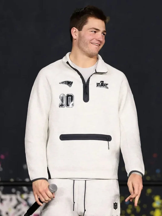 Grey Nike Tech Fleece jacket with a functional quarter zip, inspired by Drake Maye’s Super Bowl LX Opening Night New England Patriots uniform.