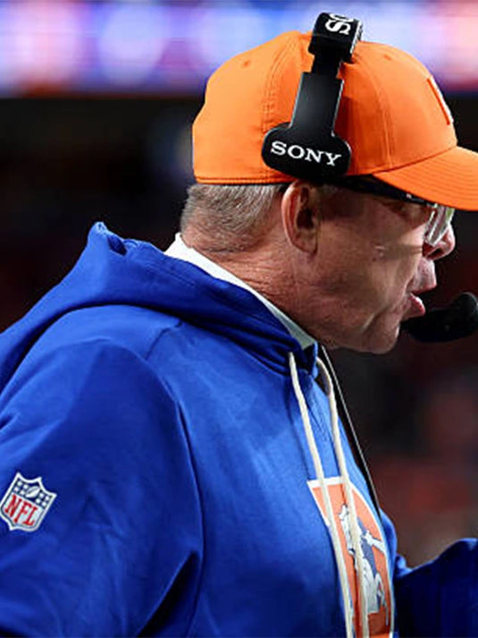 Nike Royal Denver Broncos Alt 2 Dri-FIT Hoodie worn by Coach Sean Payton, combining breathable comfort with sideline-ready style.