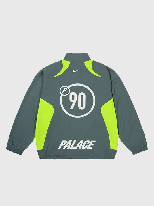 Grey Palace and Nike Total P90 track jacket from the 2025 collection featuring full zip closure.