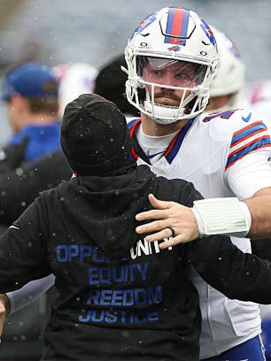 Black Nike sideline hoodie from the Buffalo Bills 2025 Inspire Change collection with bold social impact wording