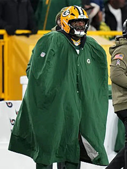 Green oversized cape coat from the 2025 Packers sideline collection inspired by the Eagles vs Packers Game look.