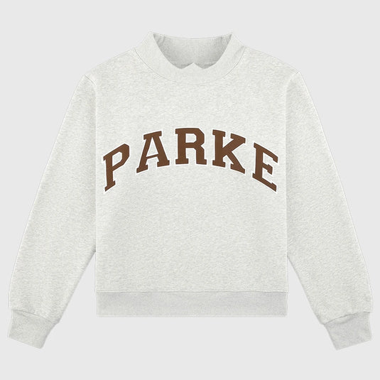 Recreated grey fleece sweatshirt with Parke Texas varsity lettering and ribbed mockneck.
