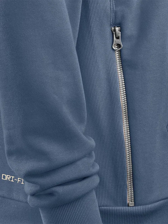 Storm blue New England Patriots Nike hoodie featuring 2025 Rivalries styling and signature sideline elements.