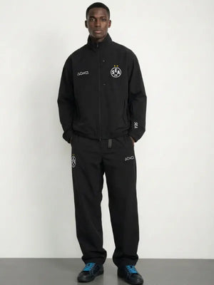 Black tech jacket recreation combining PlayStation design cues with Wind and Sea modern styling