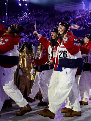 Red and white Milano Cortina 2026 Team USA puffer jacket designed for closing ceremony wear with comfortable hood and quilted warmth