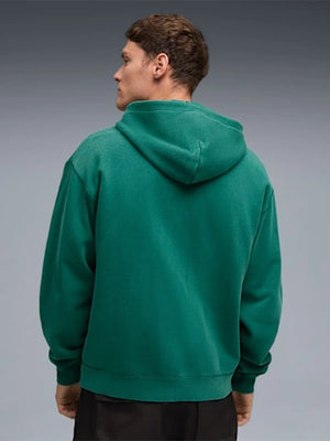 Recreated unisex green Aston Martin Aramco F1 Team fleece hoodie by PUMA with a smooth zip closure and casual comfort