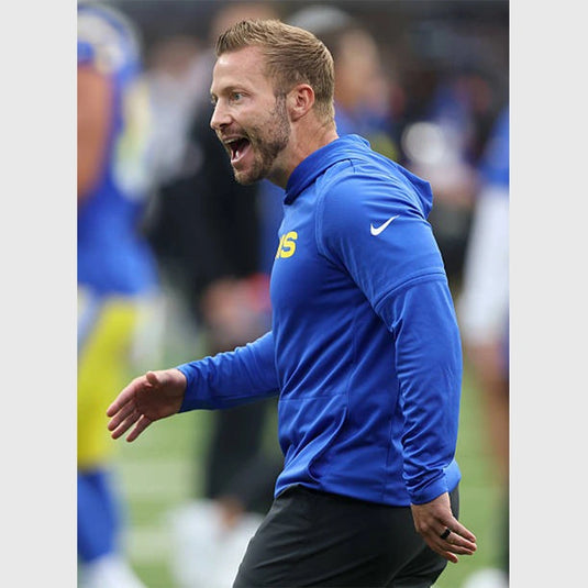 Lightweight performance hoodie t-shirt in blue modeled after Sean McVay’s 2025 LA Rams sideline outfit.