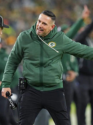 Matt LaFleur inspired recreated sideline bomber jacket combining Green Bay Packers identity with Nike athletic design