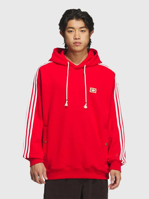 RECREATED Adidas Lunar New Year SS26 hoodie in black and red featuring soft fleece fabric and relaxed pullover fit